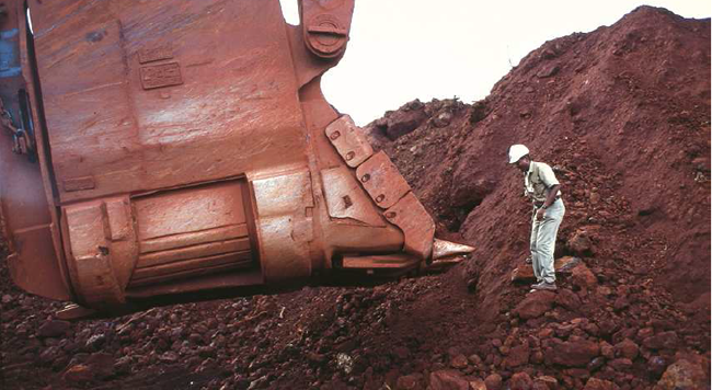 Large-scale mining equipment being directed